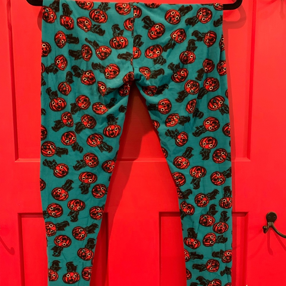 LuLaRoe one size bluish green leggings with small orange pumpkins and black cat